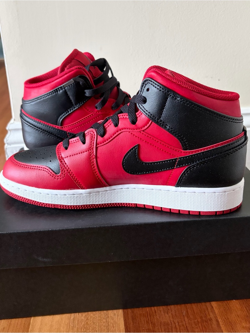 Boys Red and Black Air Jordan 1 Mid Sneakers